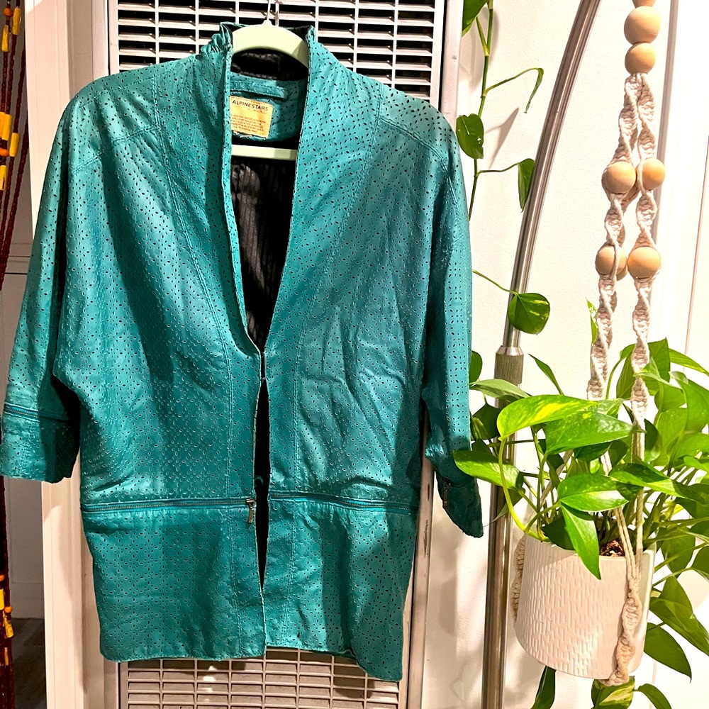 Beautiful turquoise perforated leather jacket